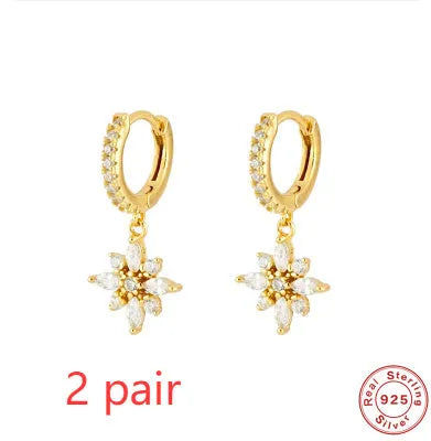 Sterling silver snowflake pendant earrings with gemstone accents in yellow gold or white gold colour options
