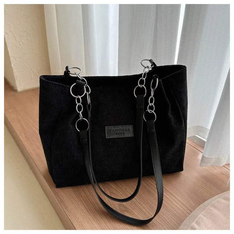Corduroy one-shoulder tote handbag in horizontal square shape with three-dimensional pockets
