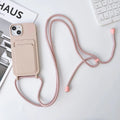 Cross body lanyard TPU phone case with card holder for Apple iPhone models, available in antique white, gray, and light pink