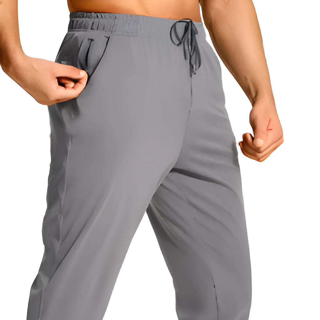 Men's loose fit casual trousers in solid colour with relaxed cut available in multiple sizes