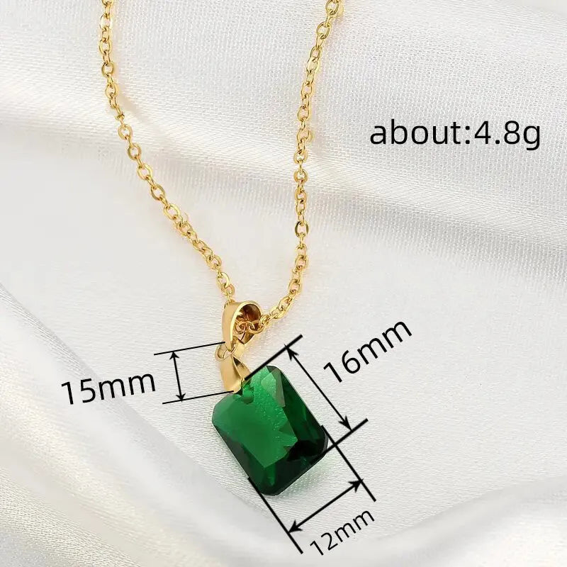 Copper necklace with green rectangular geometric quadrilateral pendant on O-ring chain.