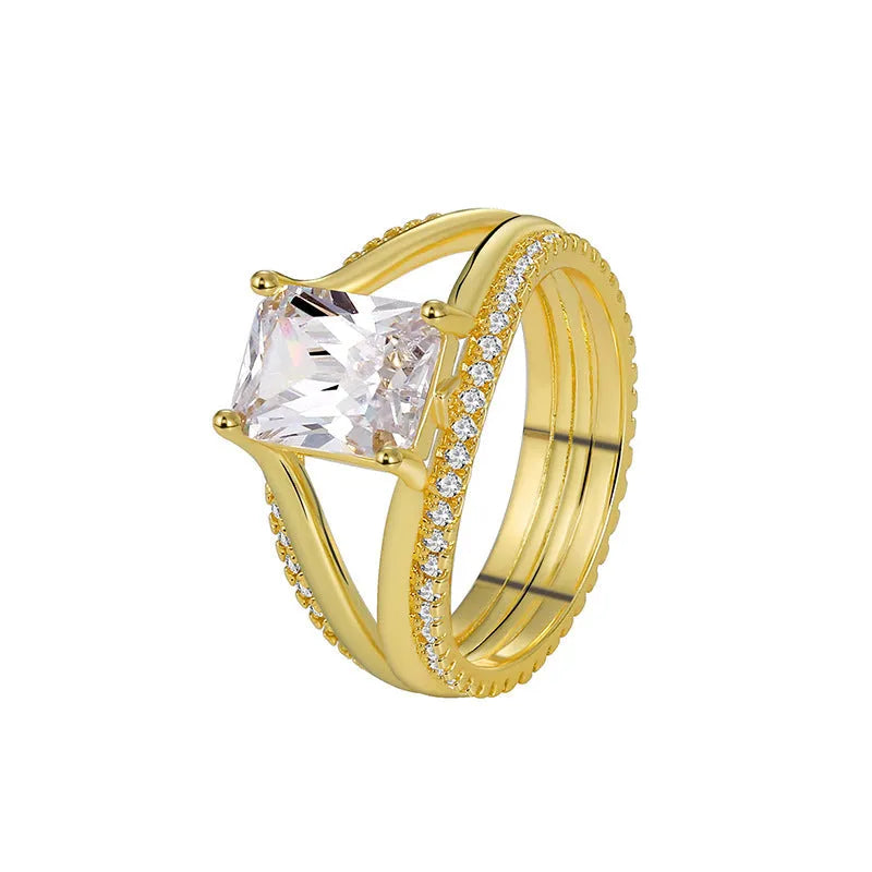 Gold geometric women's ring with zircon stones showing side and top view