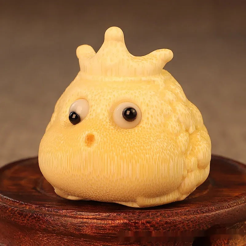 Solid bamboo carving of a cute Crown Princess Toad ornament with detailed live eyes.