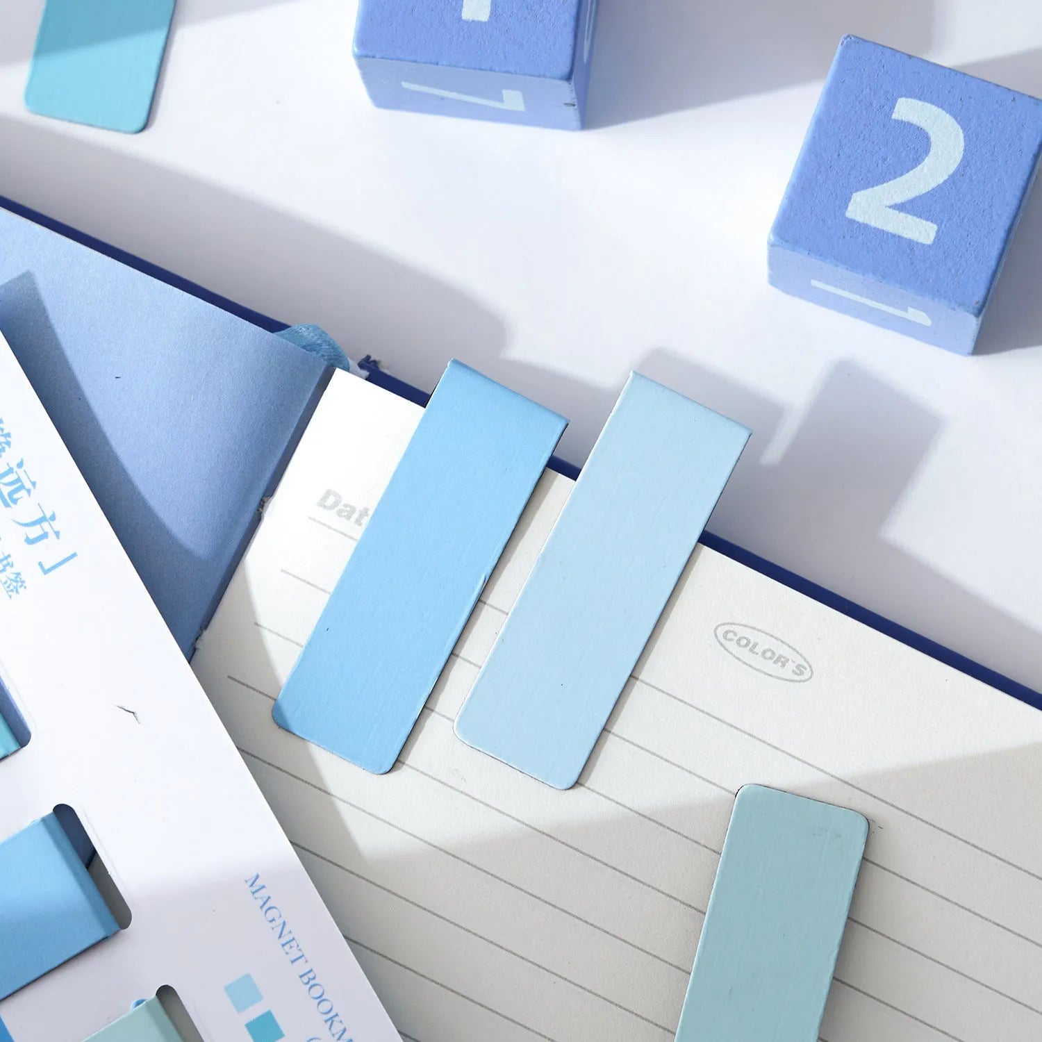 Four magnetic Morandi series colour block bookmarks in different colours arranged together
