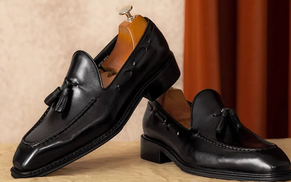 Men's black genuine leather slip-on loafers with fringed British-style design