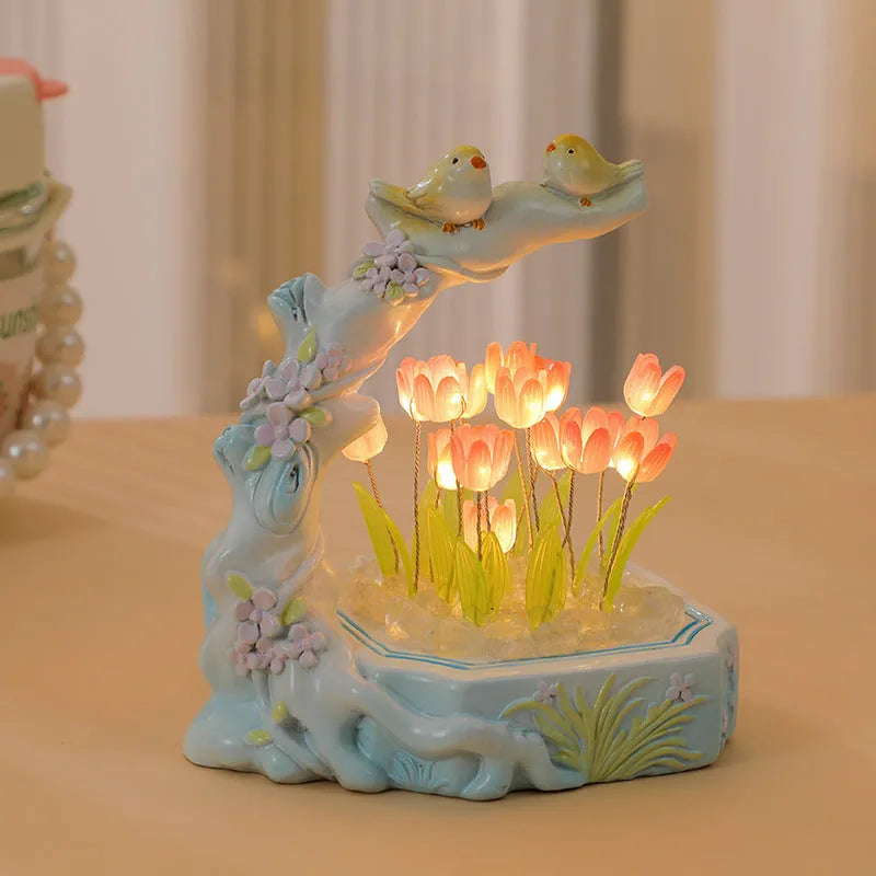Resin tulip-shaped decorative night light assembled from DIY material package on a desk.