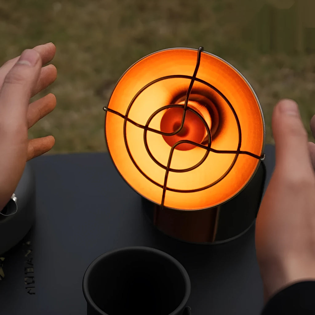 Black and orange portable camping heating stove with automatic press ignition system