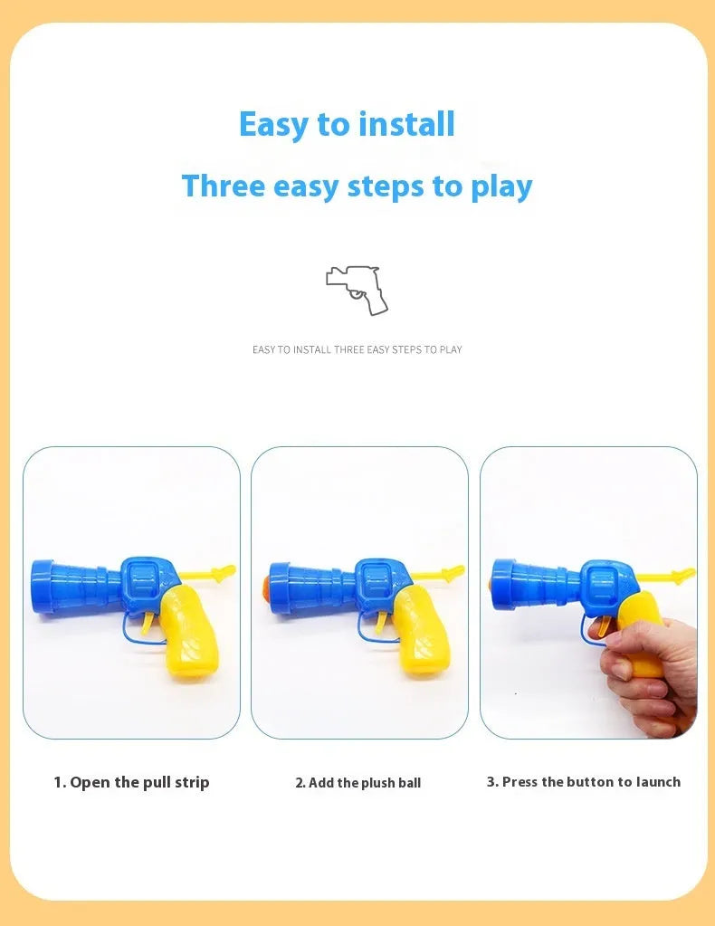 Pet toy ball launcher gun with soft plush yarn balls for interactive play with cats and dogs
