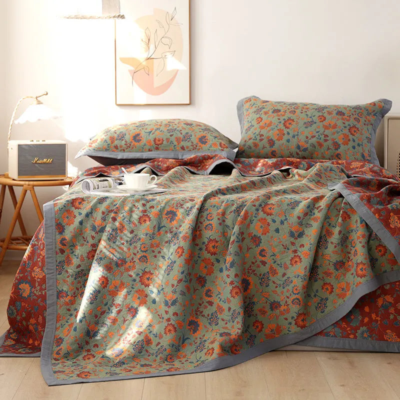 Cotton gauze bed blanket three-piece set with floral pattern showing blanket and two pillowcases