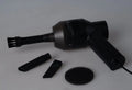 Black desktop mini vacuum cleaner with 4W power rating on a desk surface