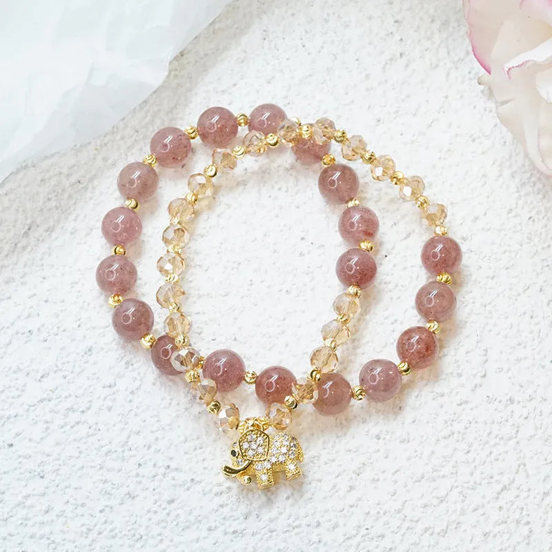 Women's retro bracelet with strawberry quartz hair crystal stones showing 521 colour variations