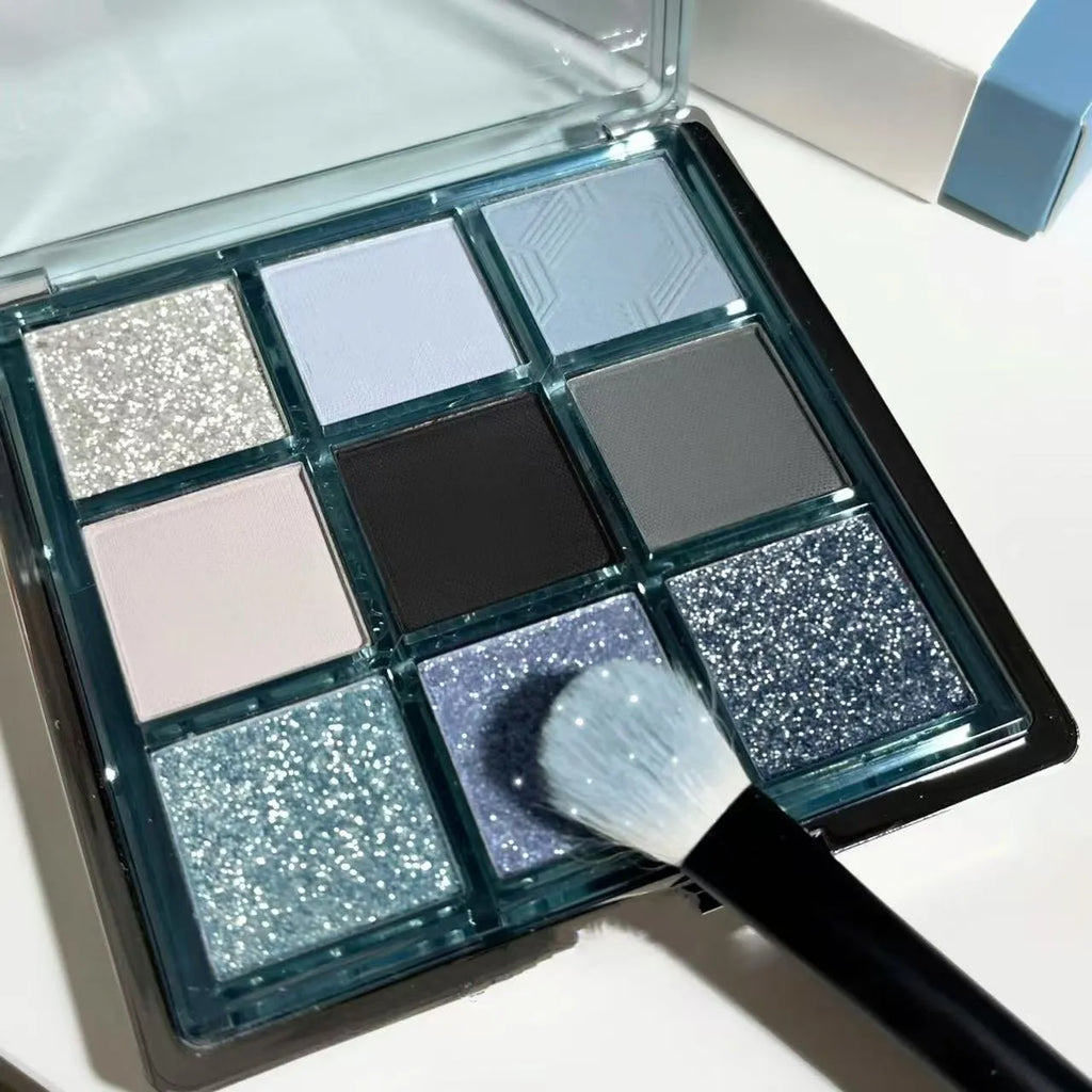 Mugeleen nine-colour eye shadow palette 08 with blue smoked design showing matte and shimmer finishes