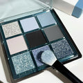 Mugeleen nine-colour eye shadow palette 08 with blue smoked design showing matte and shimmer finishes