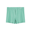 Men's loose-fitting cotton boxer shorts in a solid colour, shown in a mid waist design.
