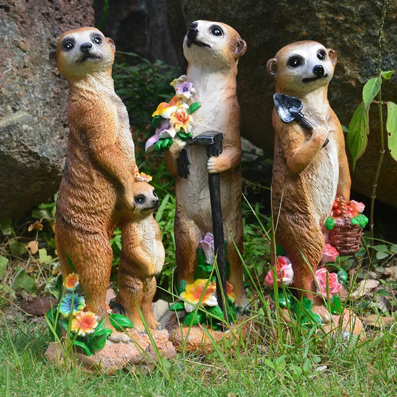 Straw hat wearing mongoose garden ornament in synthetic resin