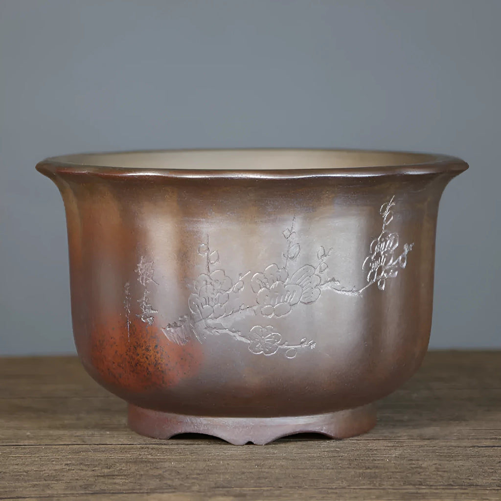 Indoor antique carved ceramic flower pot in purple sand with wood burning finish