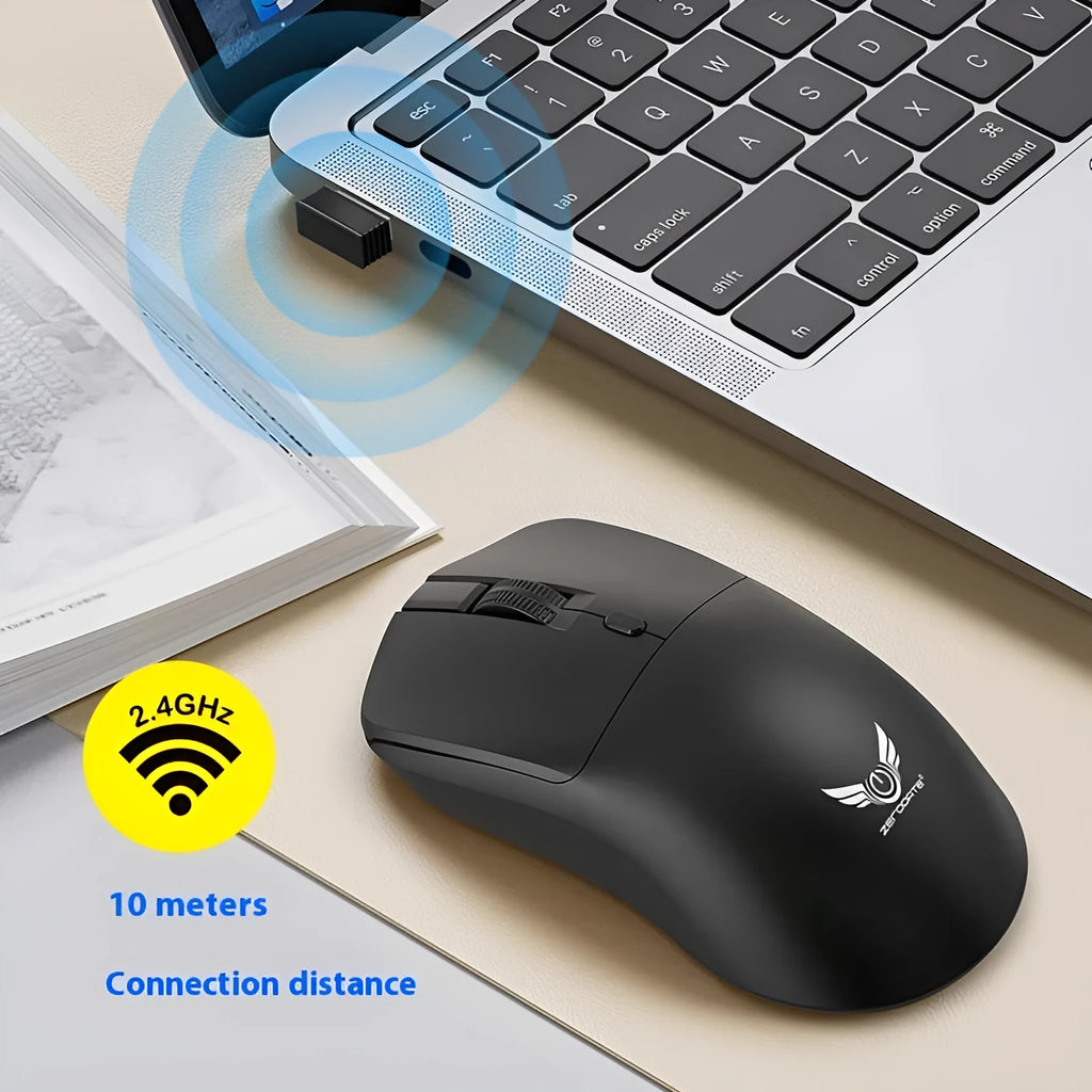 Black wireless mouse with three-gear audio buttons on a laptop desk setup