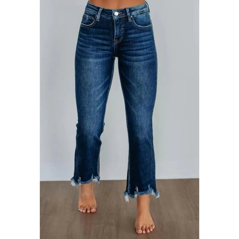 Women's solid colour denim jeans with a hand-worn finish, shown in dark blue and light blue.