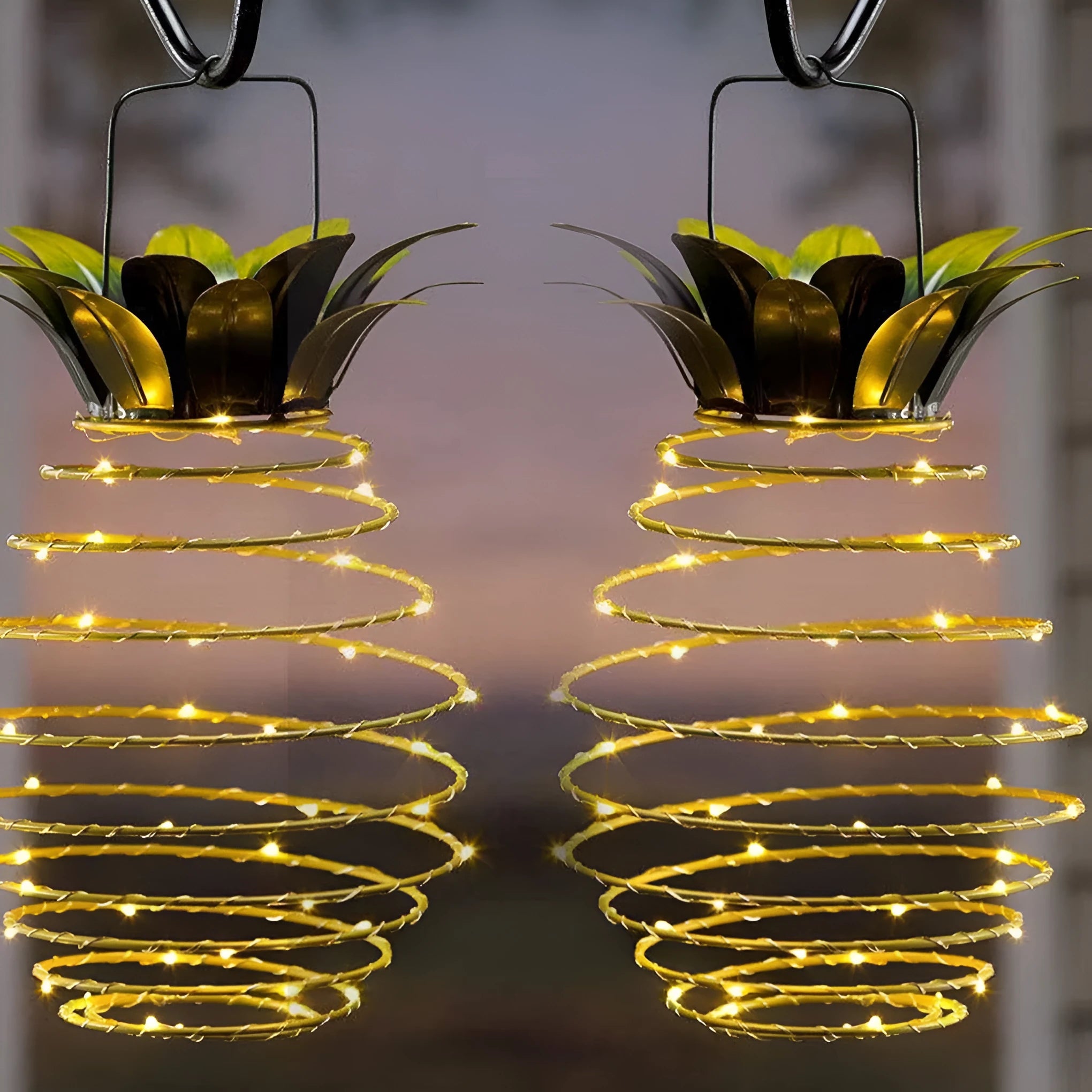 Outdoor waterproof green pineapple solar path light with 20 warm white LEDs and metal frame on a garden table
