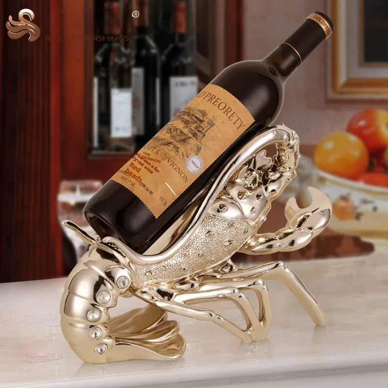 Metallic rose gold lobster-shaped resin ornament holding a wine bottle.