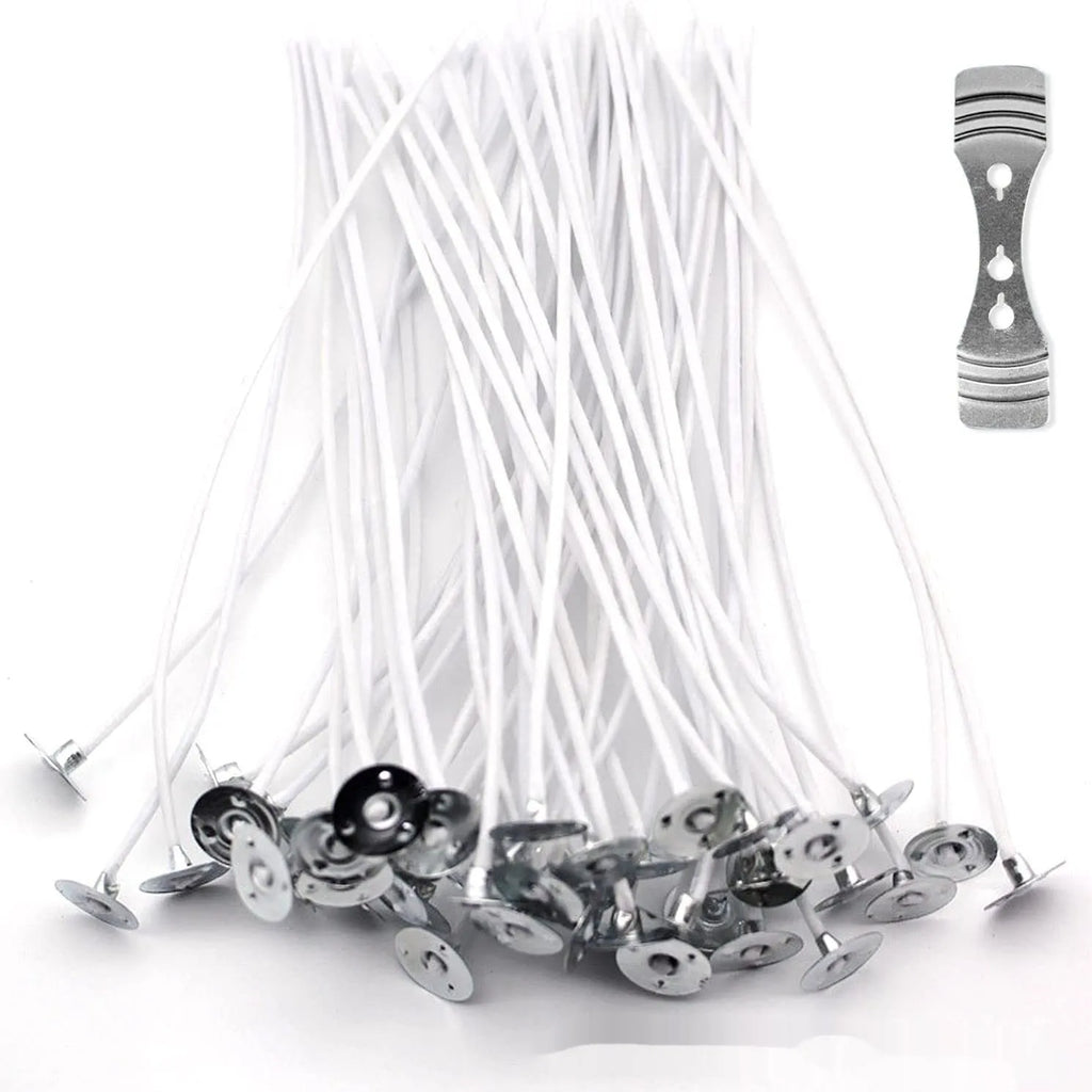 White cotton candle wicks showing tightly woven construction in three different lengths