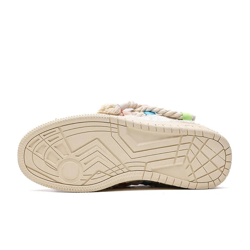 Creamy white retro skate shoes with low platform sole and lace-up design