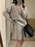 Women's casual knitted sweater shorts matching set in imitation cashmere fabric with embroidery details