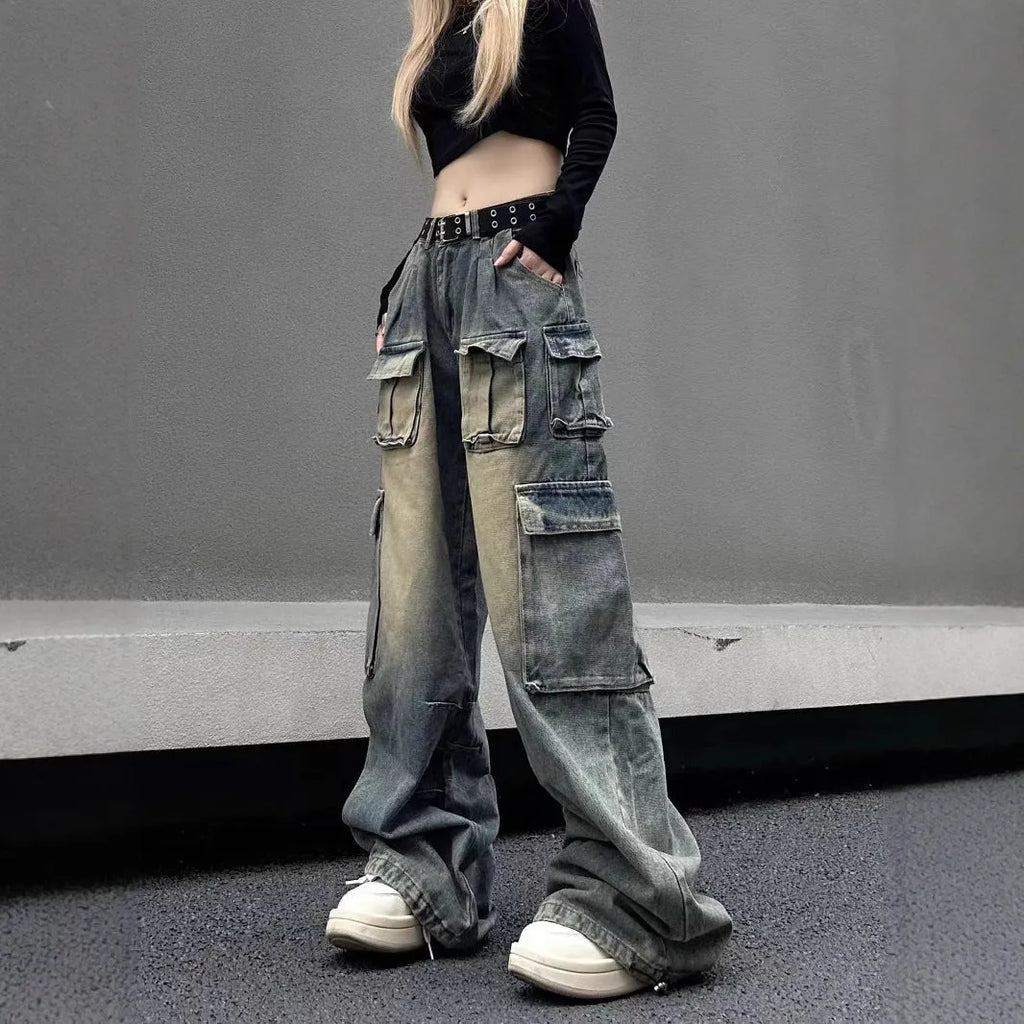 Multi-pocket loose distressed jeans in washed denim with straight-leg cut and tooling style pockets