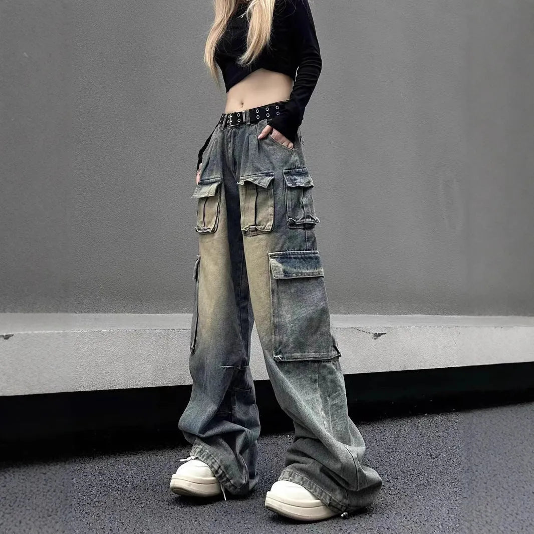 Multi-pocket loose distressed jeans in washed denim with straight-leg cut and tooling style pockets