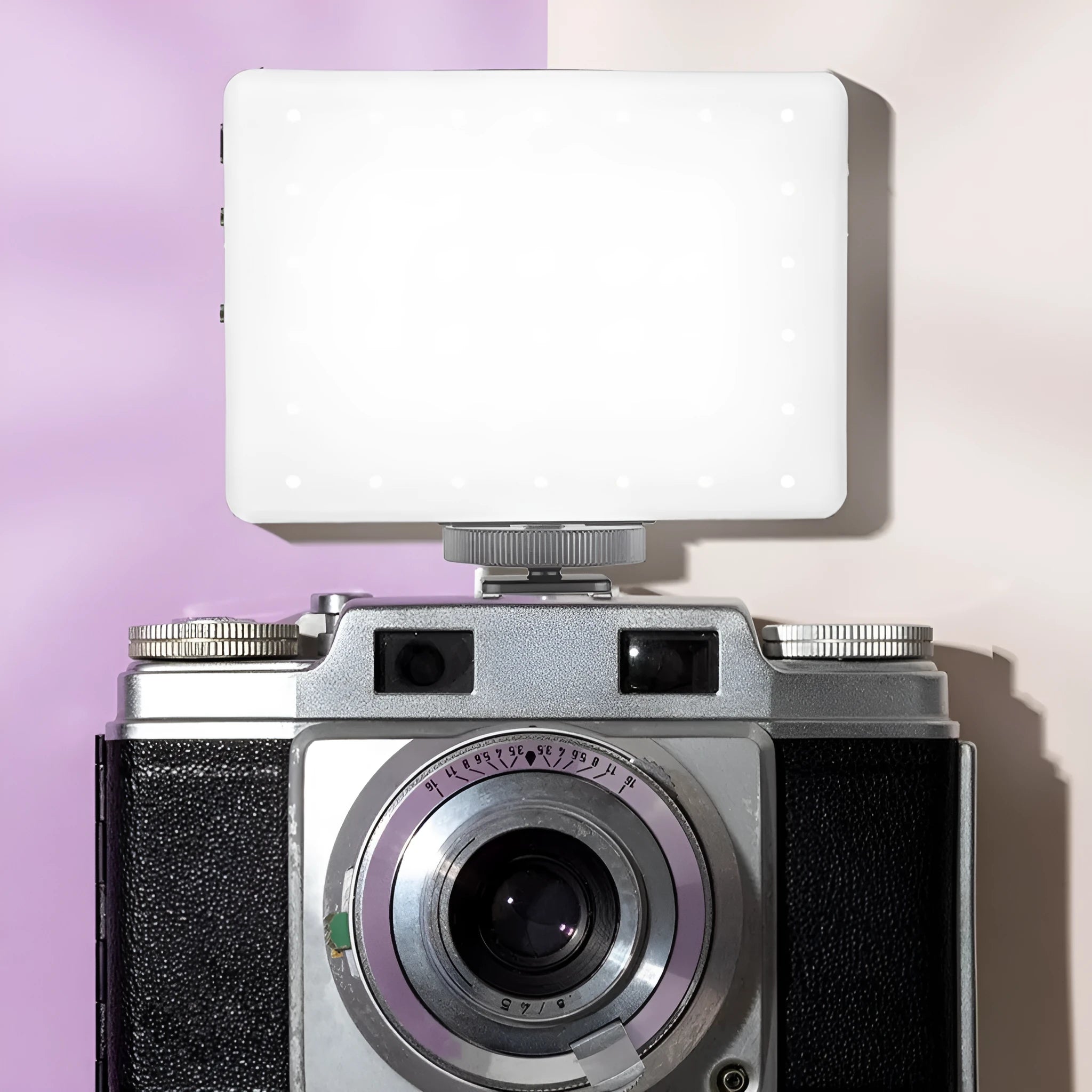 LED pocket fill light with clip attached to mobile phone for photography