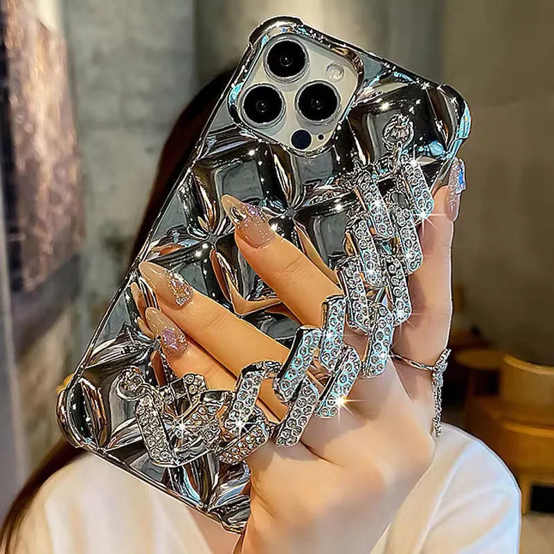 iPhone case with chain design and diamond bracelet wrist strap in silver or gold finish