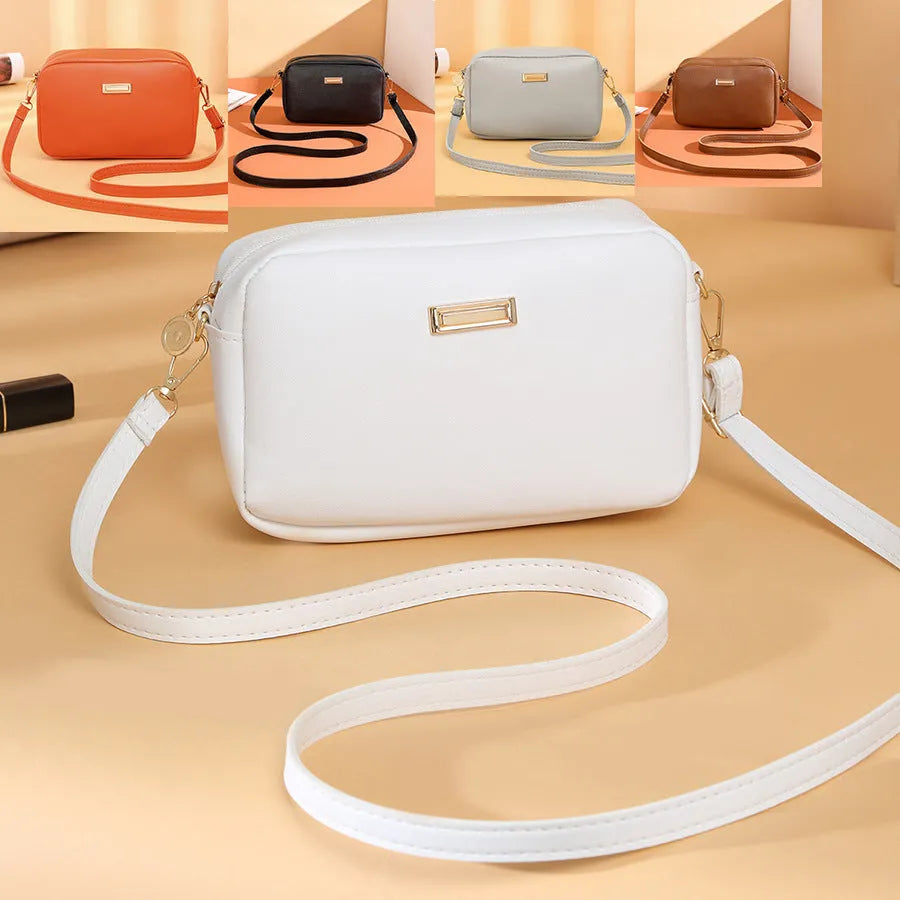 Women's PU shoulder bag in horizontal square shape with three-dimensional pocket, shown in solid colour options.