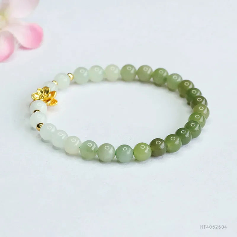 Hand-woven ancient style bracelet with Hetian jade water gradient colour and flower shape.