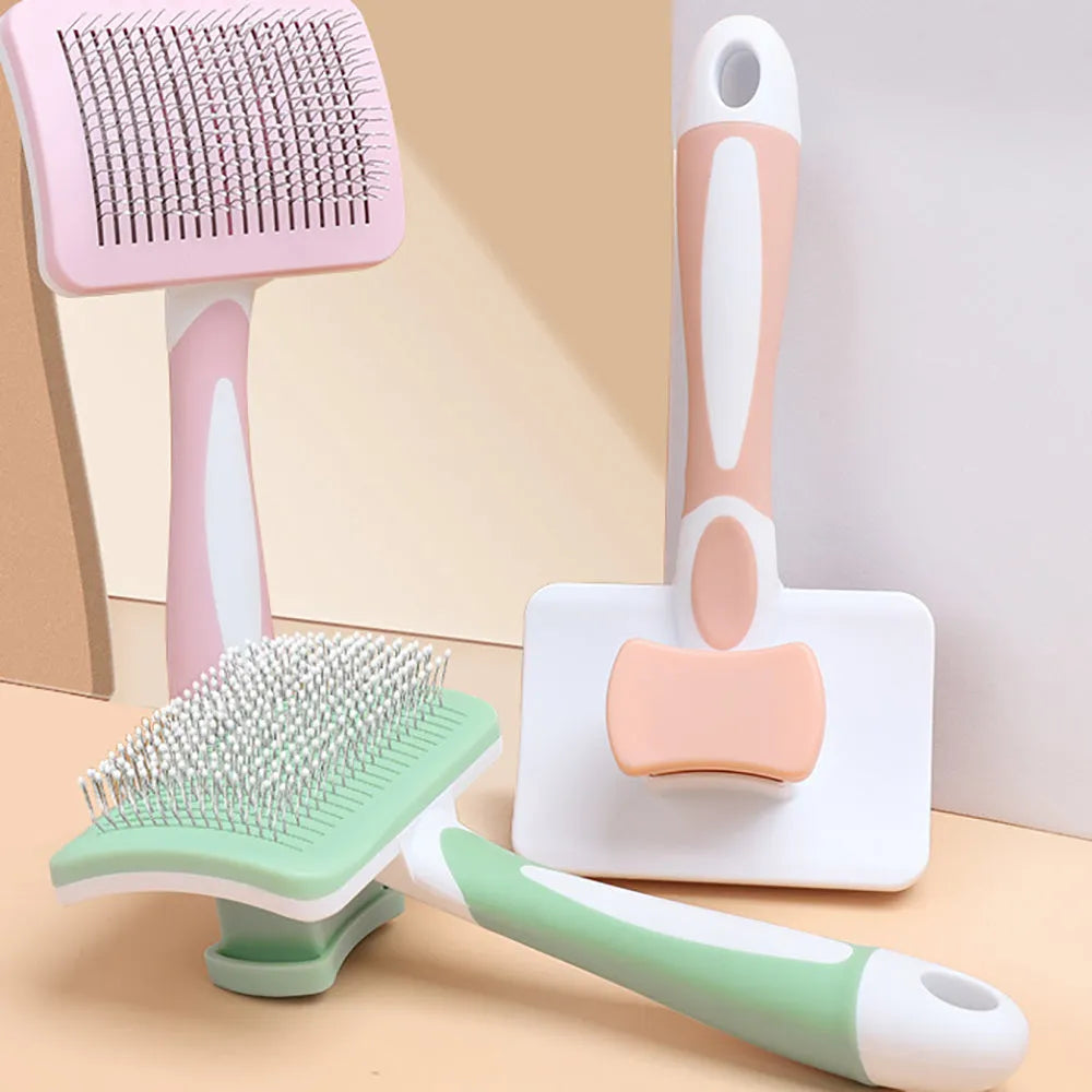 Self-cleaning slicker brush for dogs and cats with one-click hair removal button, available in green, orange, and pink