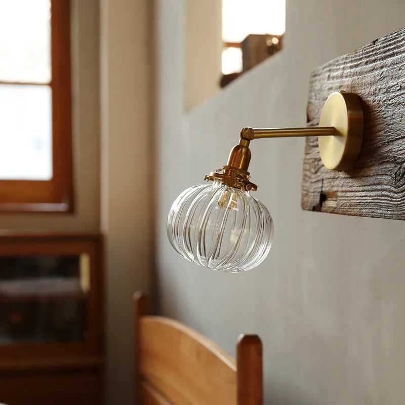 Pumpkin-shaped glass wall lamp in blue without stripes finish