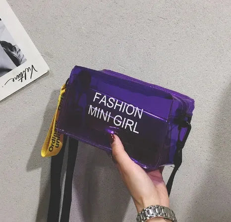 Transparent square jelly shoulder bag with adjustable strap showing internal mobile phone compartment