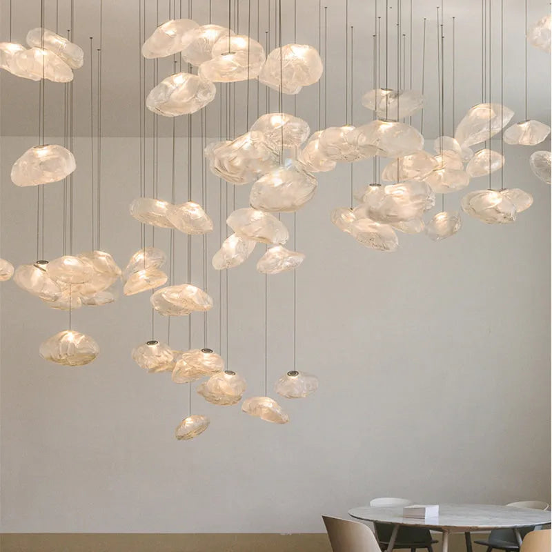 Modern minimalist glass chandelier with LED lighting in amber, clear, or smoke grey colour options