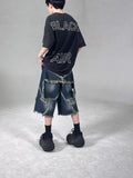 Men's blue denim shorts with frayed edges and five-pointed star design, loose fit for summer