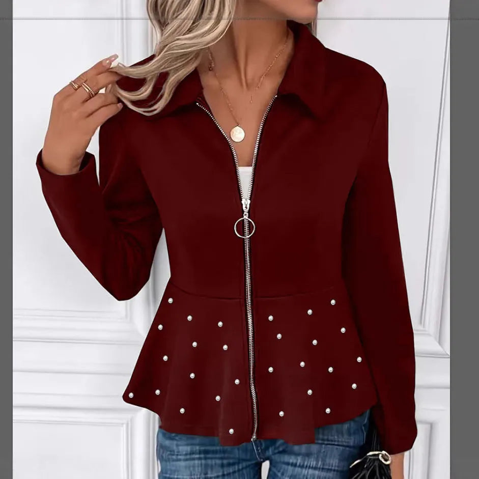 Women's black loose fit coat with heavy-duty zipper and beaded ruffled hem detail