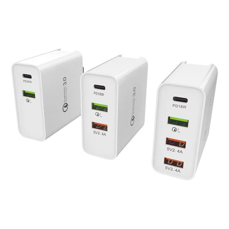 White multi-port fast charger with Power Delivery and Quick Charge support showing USB-C and USB-A ports