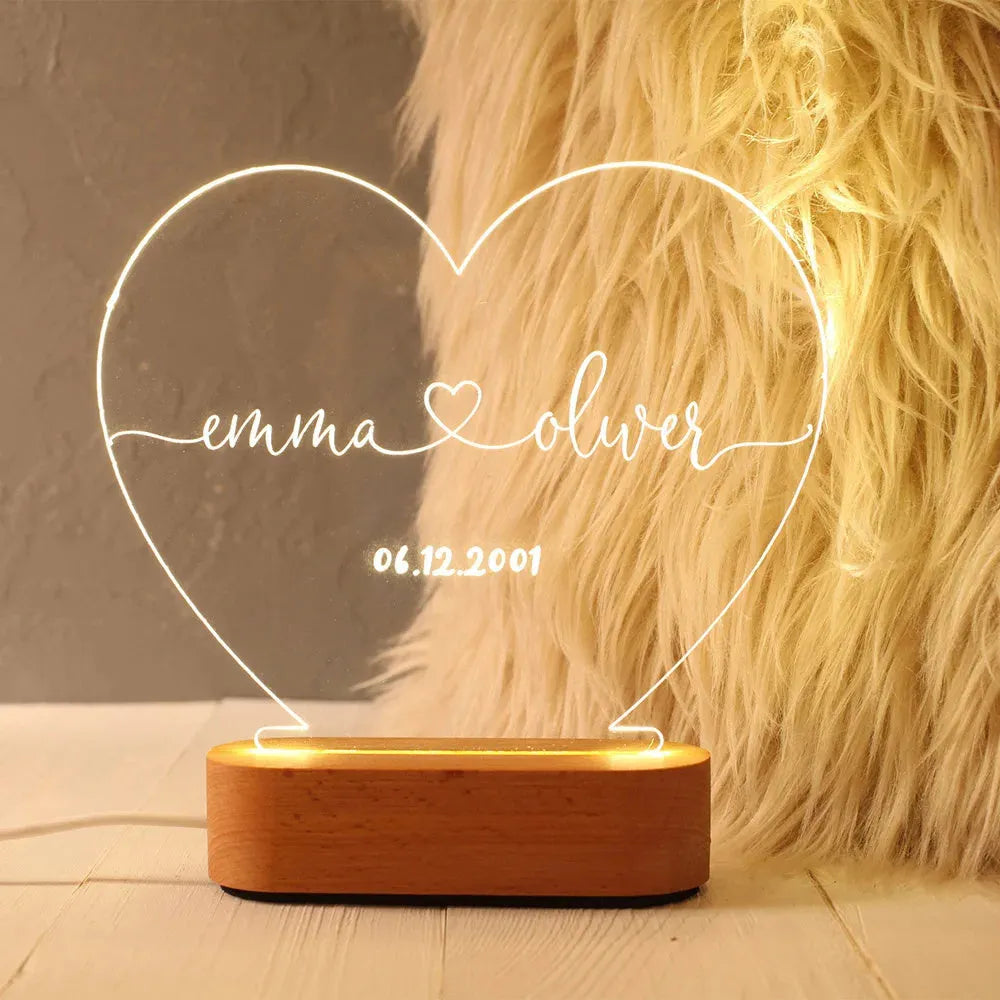 Personalised acrylic LED night light showing custom names and date, modern art design, 20cm by 11.5cm