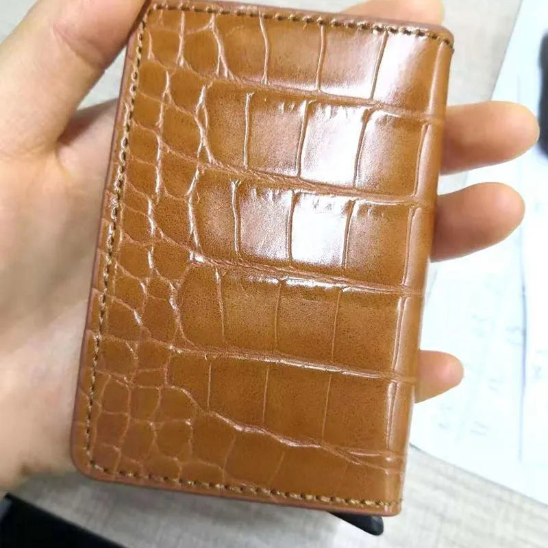 Pattern wallet with metal cartridge automatic pop-up in black polyurethane leather showing card slots