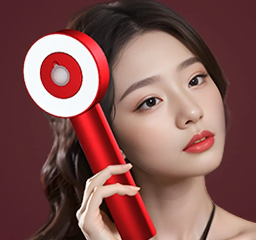 Red and blue light therapy massage hair comb in black or red plastic with Type-C charging port.