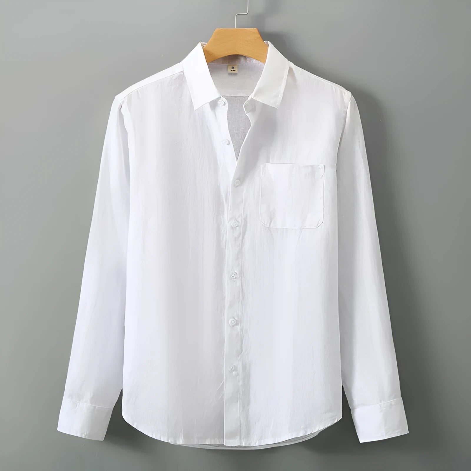 Chinese style linen cardigan shirt in a solid colour with long sleeves and a loose fit.