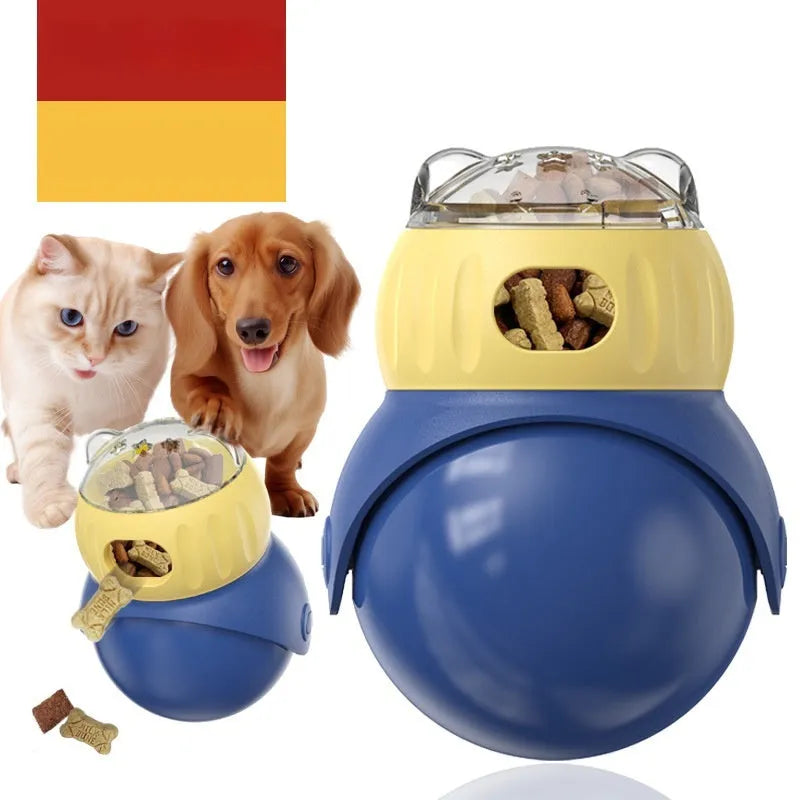 Yellow and blue plastic tumbler-style cat feeder puzzle toy on a floor.
