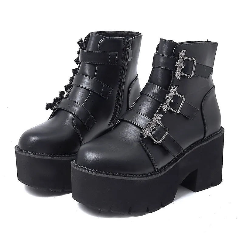 Black women's Harajuku punk ankle boots with bat buckle, thick heel, and side zip.