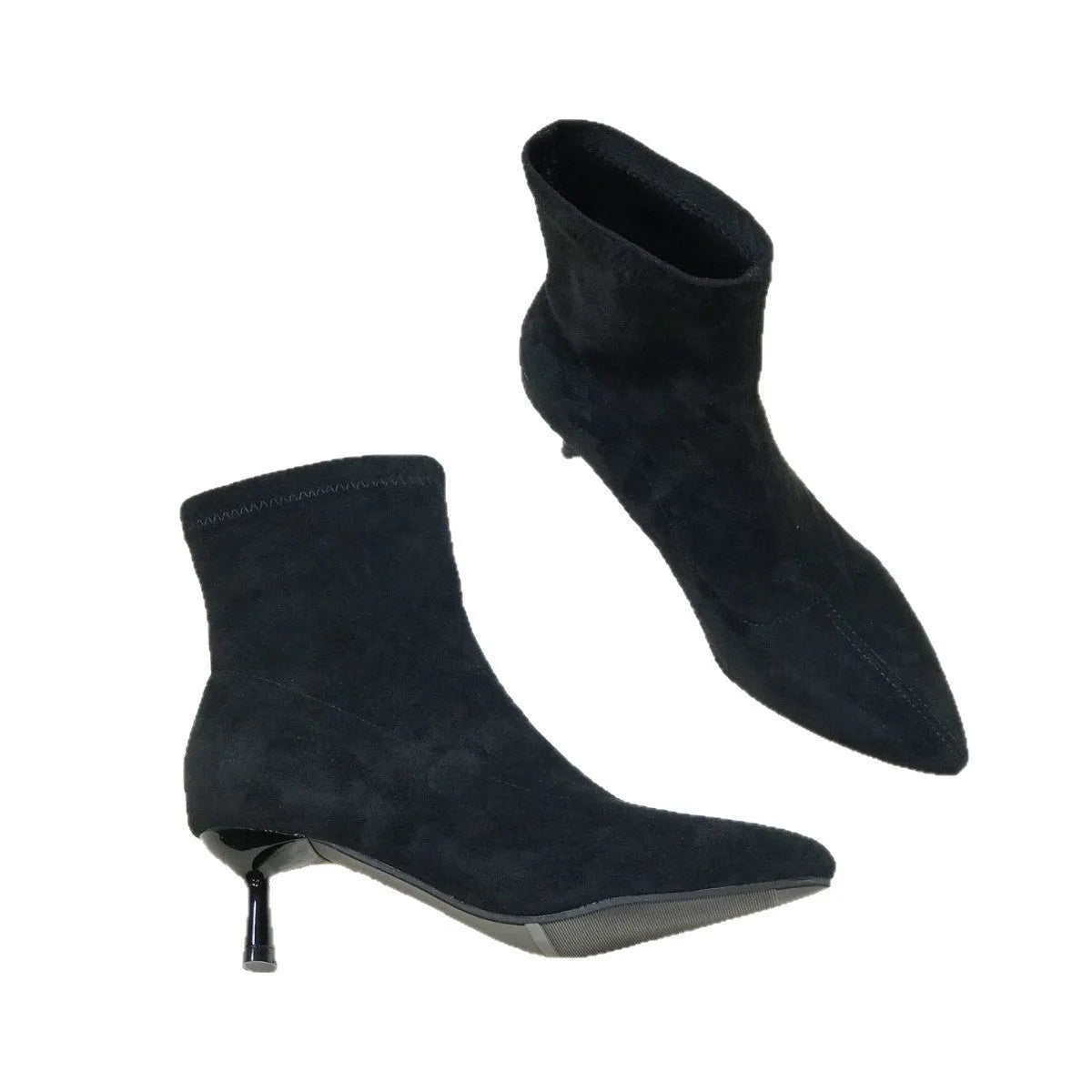 Black pointed toe ankle boots with high stiletto heel and mid-calf shaft showing microfiber texture