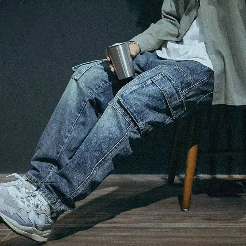 Men's blue loose straight leg retro style casual trousers on a neutral background