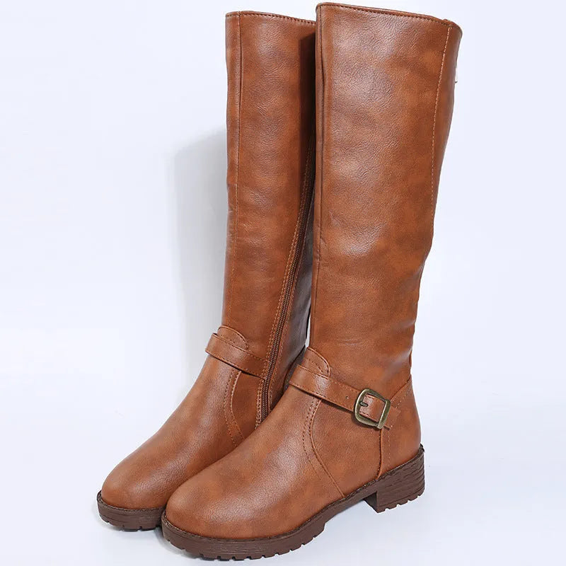 Women's black knight boots with a square heel, high shaft, and a front belt buckle fastening.
