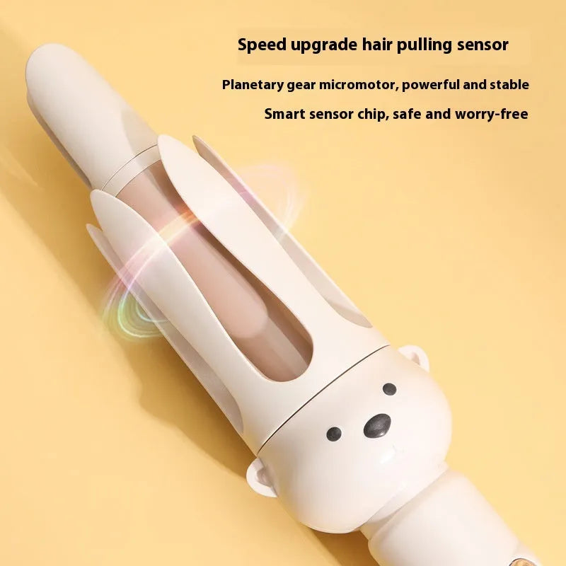 Beige FS-H208 anion automatic hair curler with attached hair stick on a white background.